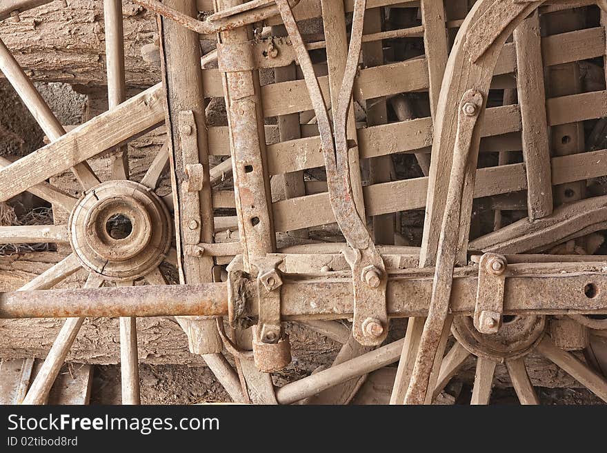 Pieces from old cart still life - dusty wood texture