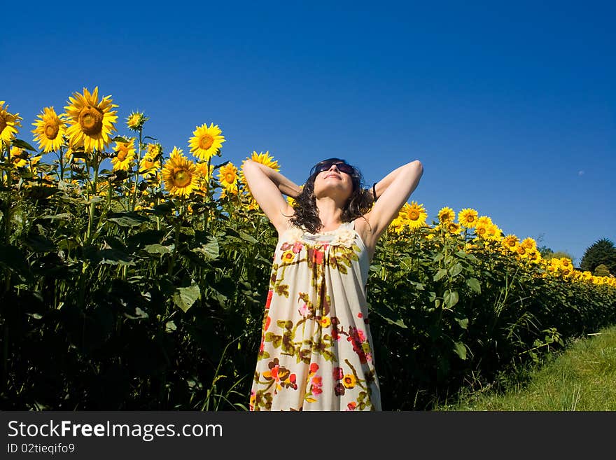 Young beautiful woman on field