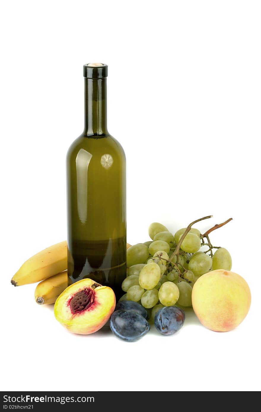 Wine bottle and fruits