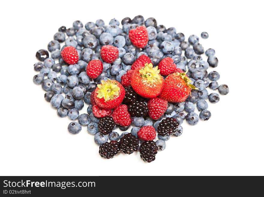 Composition of ripe black and red raspberries, strawberries and blackberries. Composition of ripe black and red raspberries, strawberries and blackberries