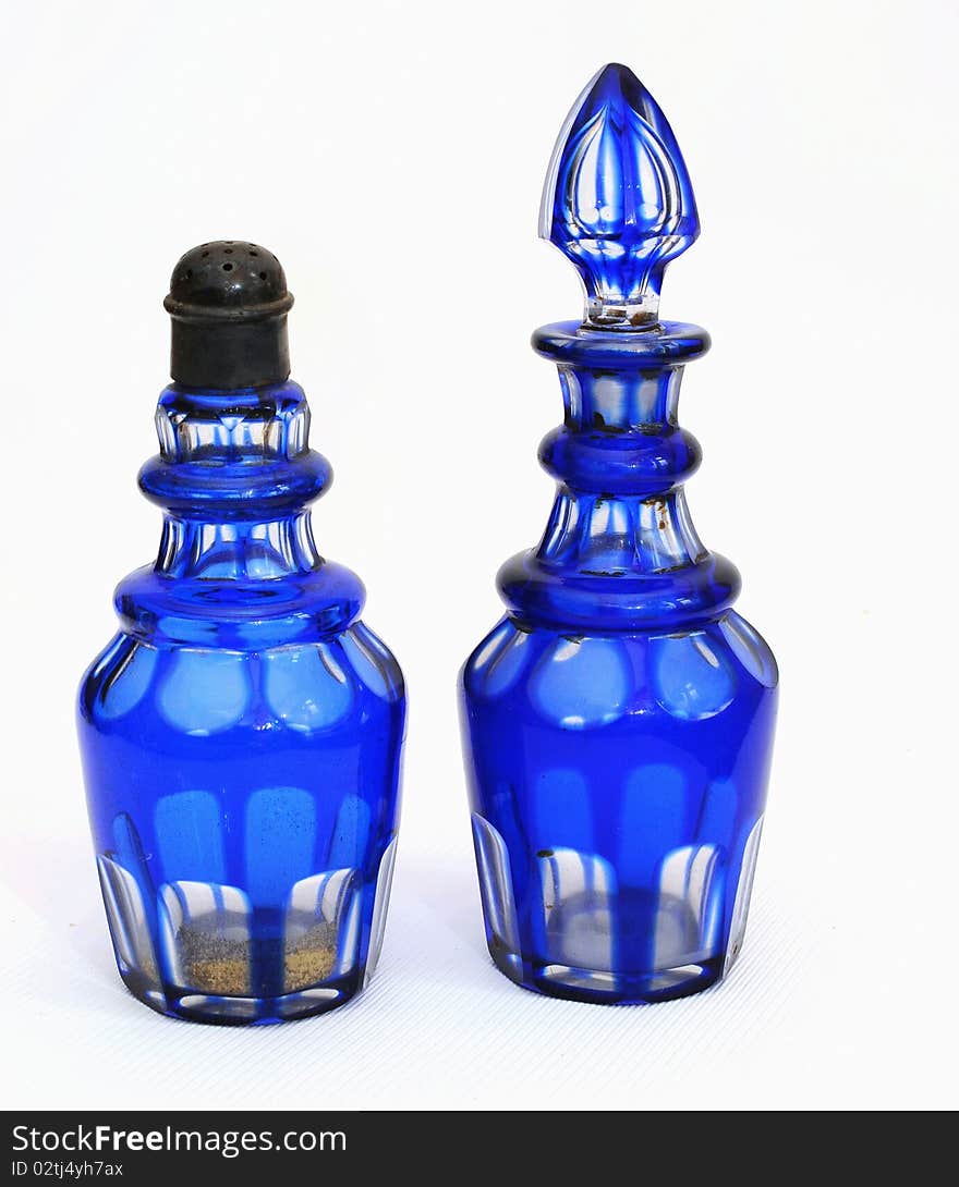 Two dark blue bottles