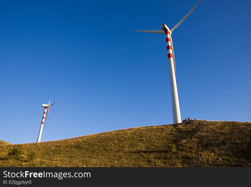 Windmill in the mountains of italy to produce energy. Windmill in the mountains of italy to produce energy