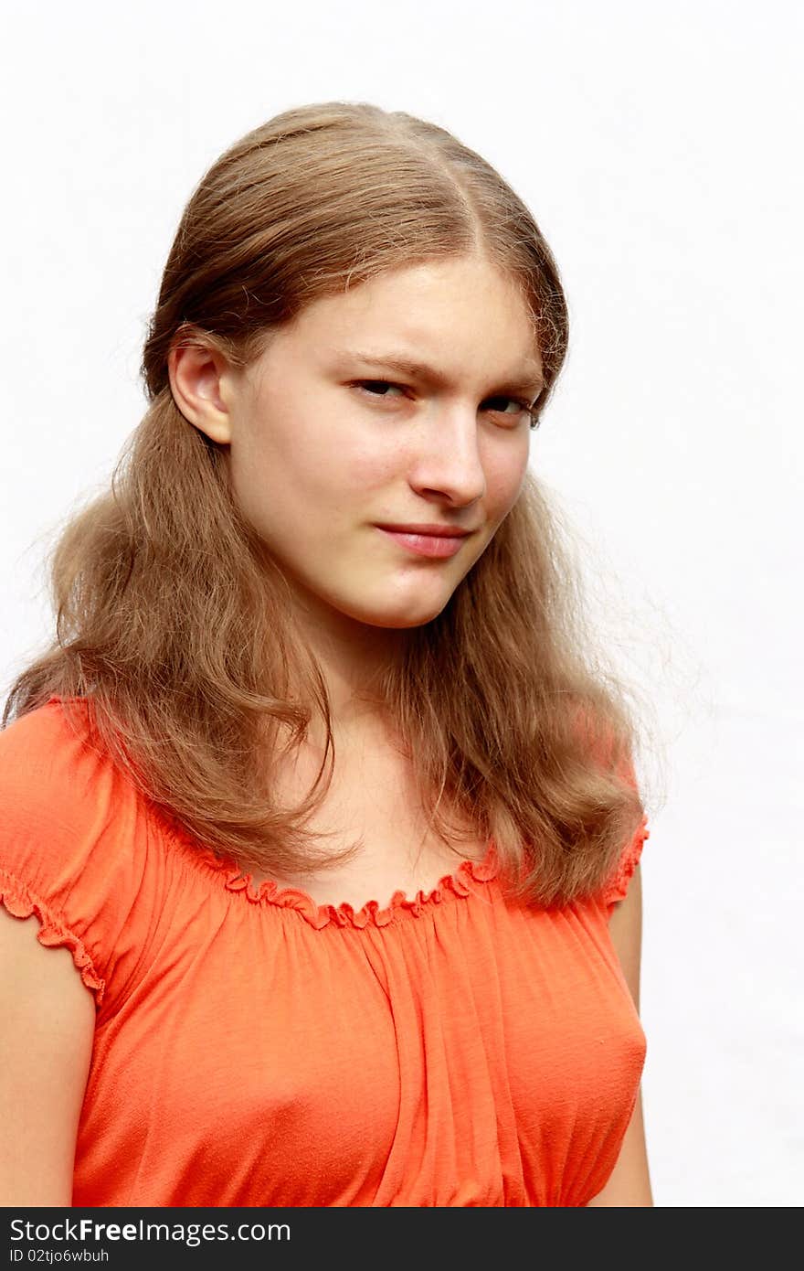 Portrait of the teenager in a red jacket on a white background. Portrait of the teenager in a red jacket on a white background