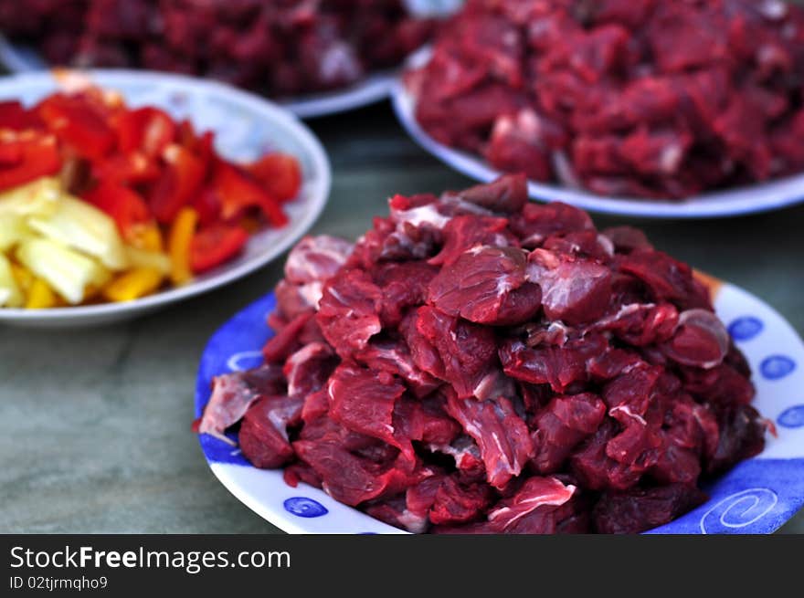 Sliced raw beef.