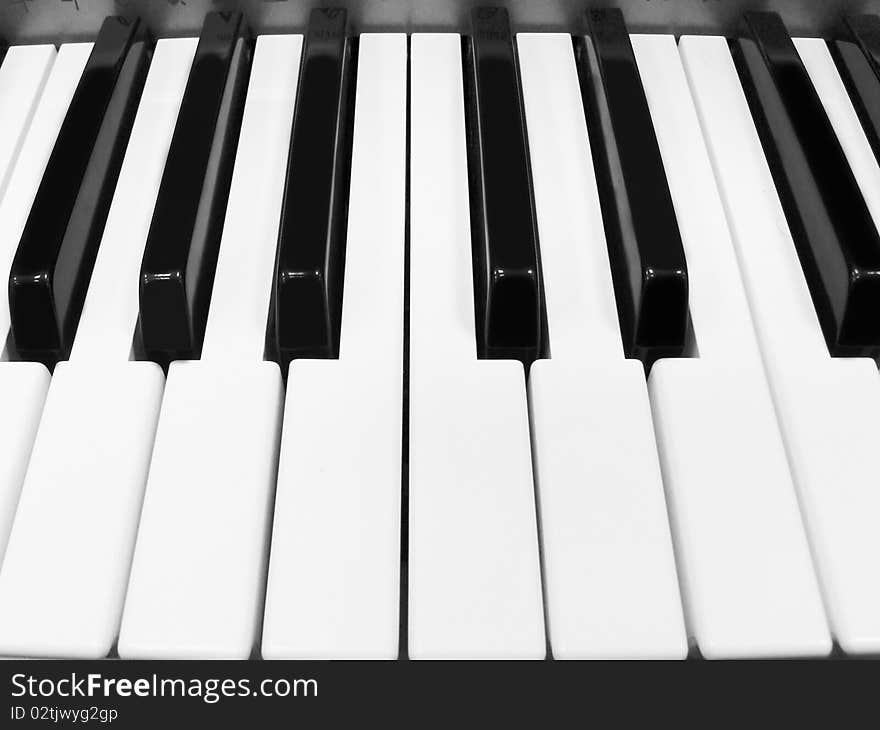 The image of piano keyboard with white and black keys