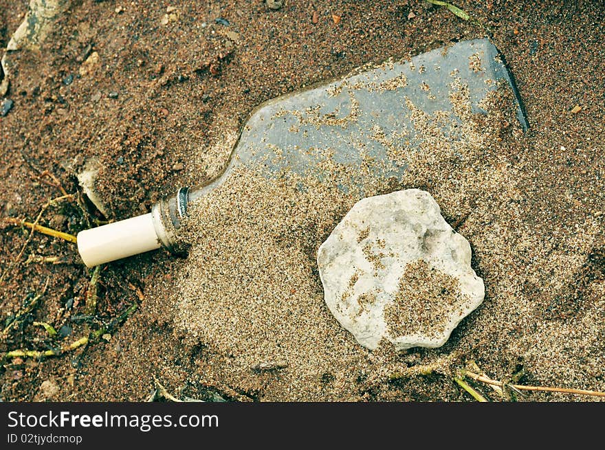 Old paper, tied with a rope in a pot of whiskey or rum. Old paper, tied with a rope in a pot of whiskey or rum