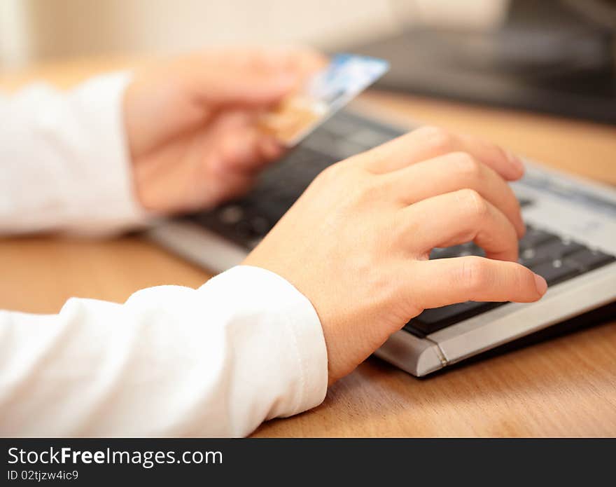 Hand typing on laptop keyboard. Shallow DOF. Hand typing on laptop keyboard. Shallow DOF