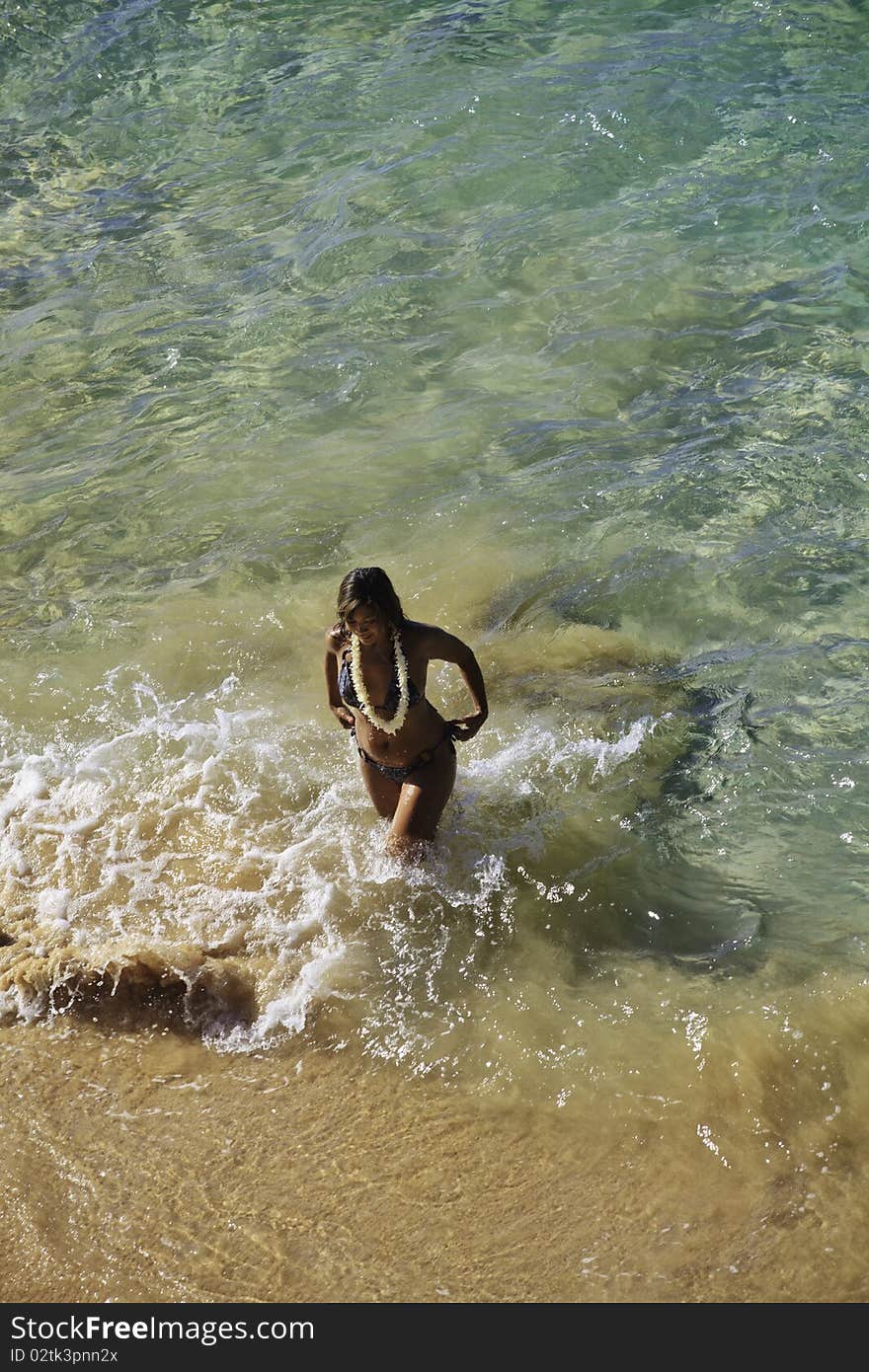 Young polynesian woman at makena beach in maui, hawaii. Young polynesian woman at makena beach in maui, hawaii