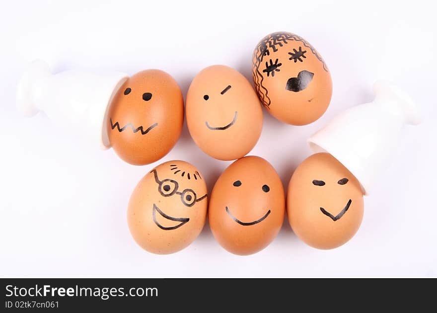 Eggs with smiling faces on white background. Eggs with smiling faces on white background