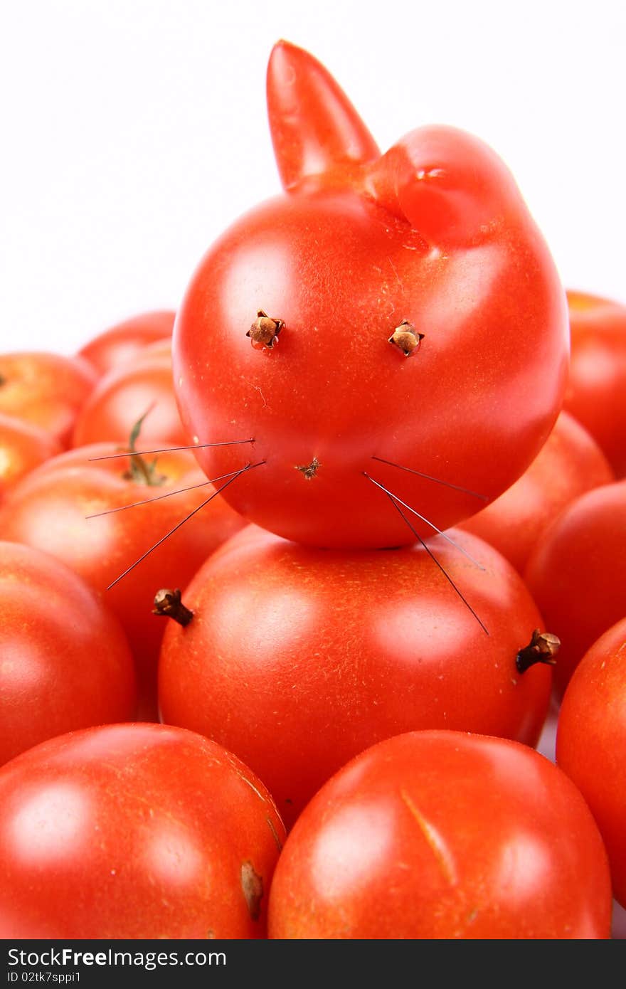 Rabbit made of tomatoes with eyes and legs made of dried cloves. Rabbit made of tomatoes with eyes and legs made of dried cloves