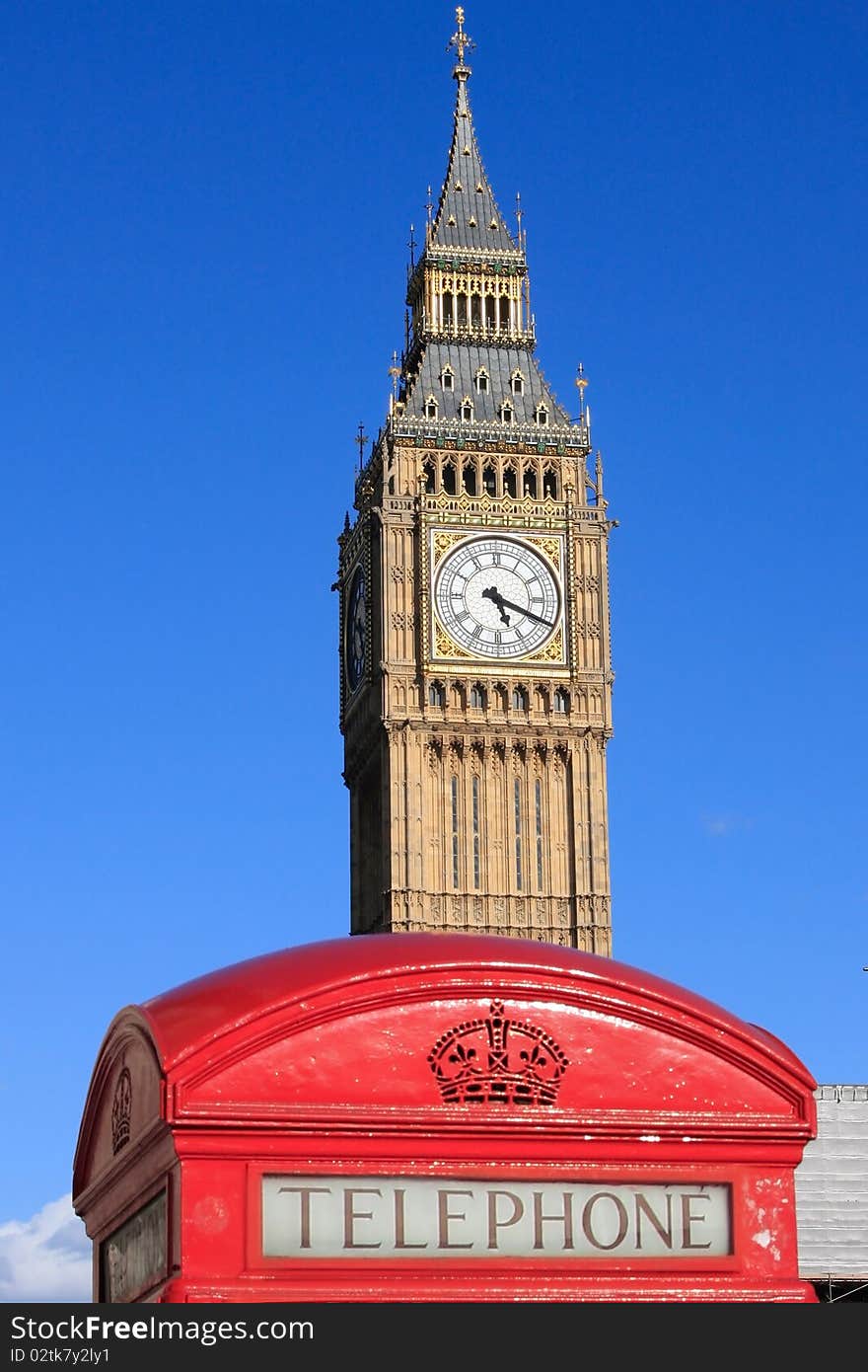 Famous Big Ben clock tower with phone booth in Lon