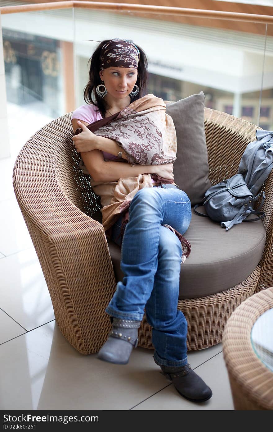 Shopping mall, Cafe, Girl is having a rest. Shopping mall, Cafe, Girl is having a rest.