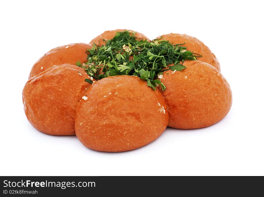 Buns with garlic and parsley on a white background