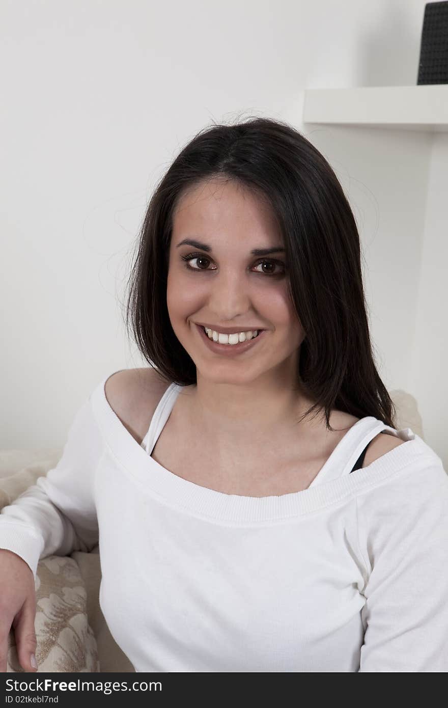 Portrait of beautiful brunette, smiling at the camera. Portrait of beautiful brunette, smiling at the camera