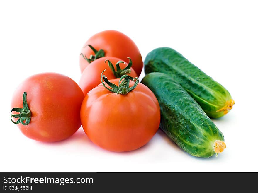 Red Tomatoes And Green Cucumbers