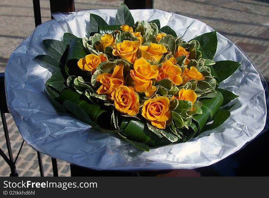 A beautiful flower bouquet of yellow roses. A beautiful flower bouquet of yellow roses.