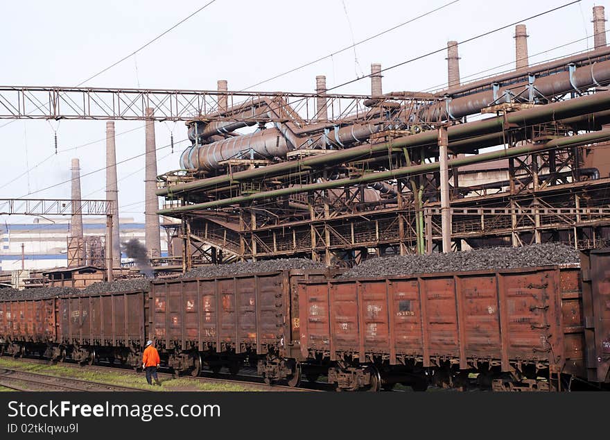 Industrial landscape with railroad and chemicals plant