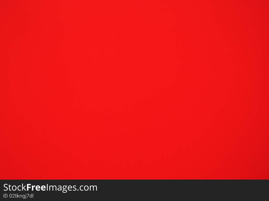 This is a macro photo of a red silk banner. This is a macro photo of a red silk banner.