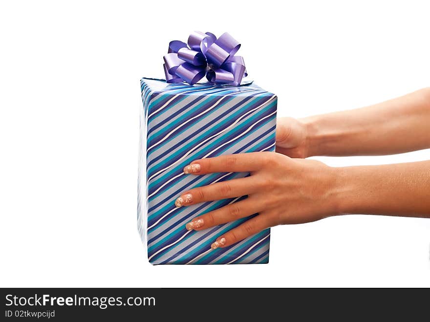 Woman giving a present in the blue box with bow. White background. Woman giving a present in the blue box with bow. White background