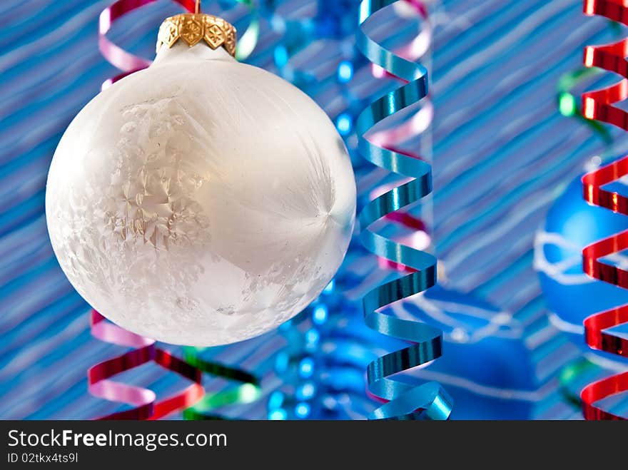 Christmas decoration from white and blue balls on blue background. Christmas decoration from white and blue balls on blue background