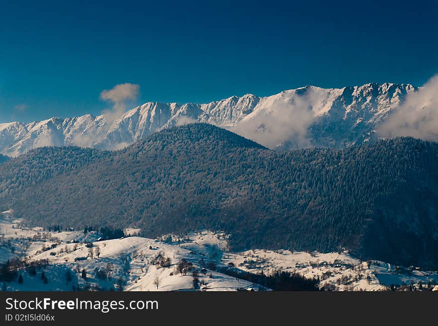 Winter Landscape: Clouds and Mountains