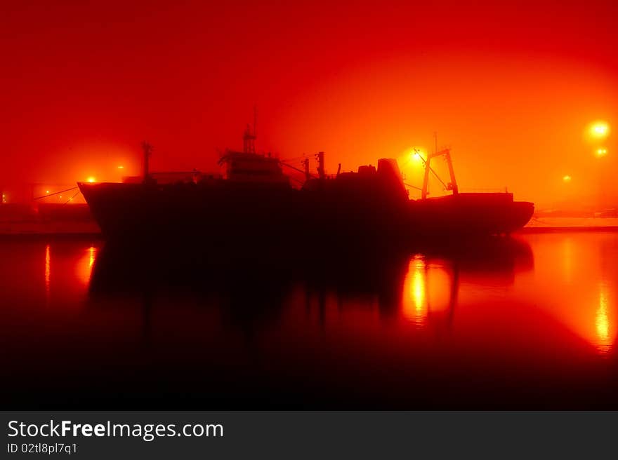 Cargo ship docked in port. Cargo ship docked in port