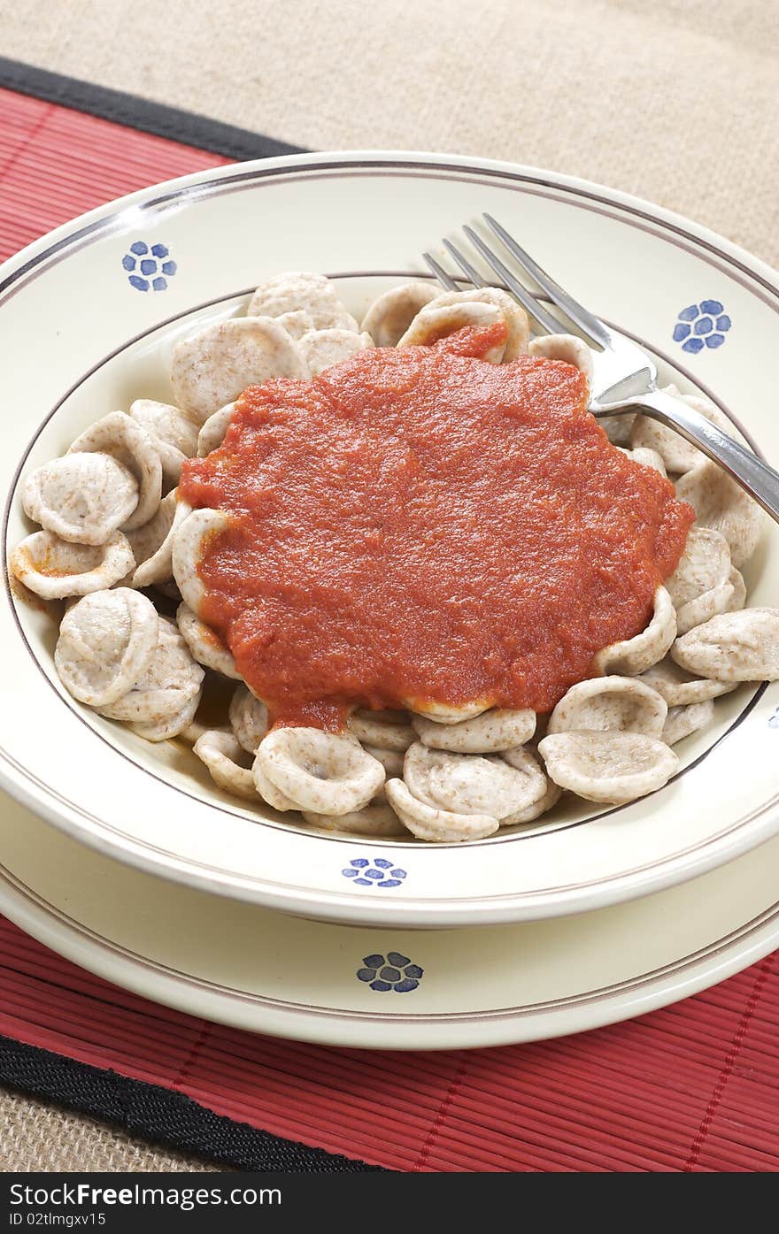 South italian traditional recipe orecchiette pasta with tomato sauce