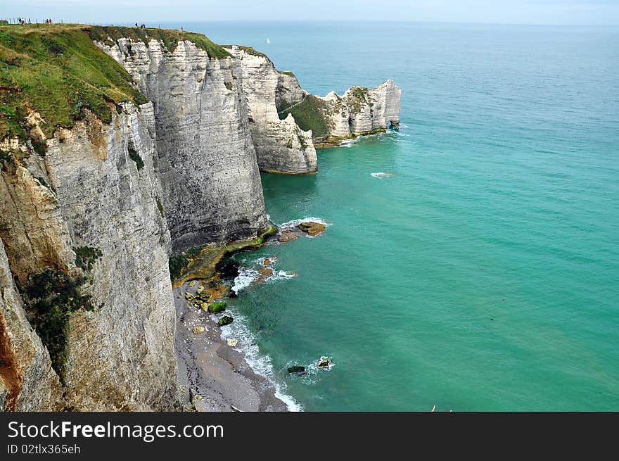 Cliffs in a sea of emerald