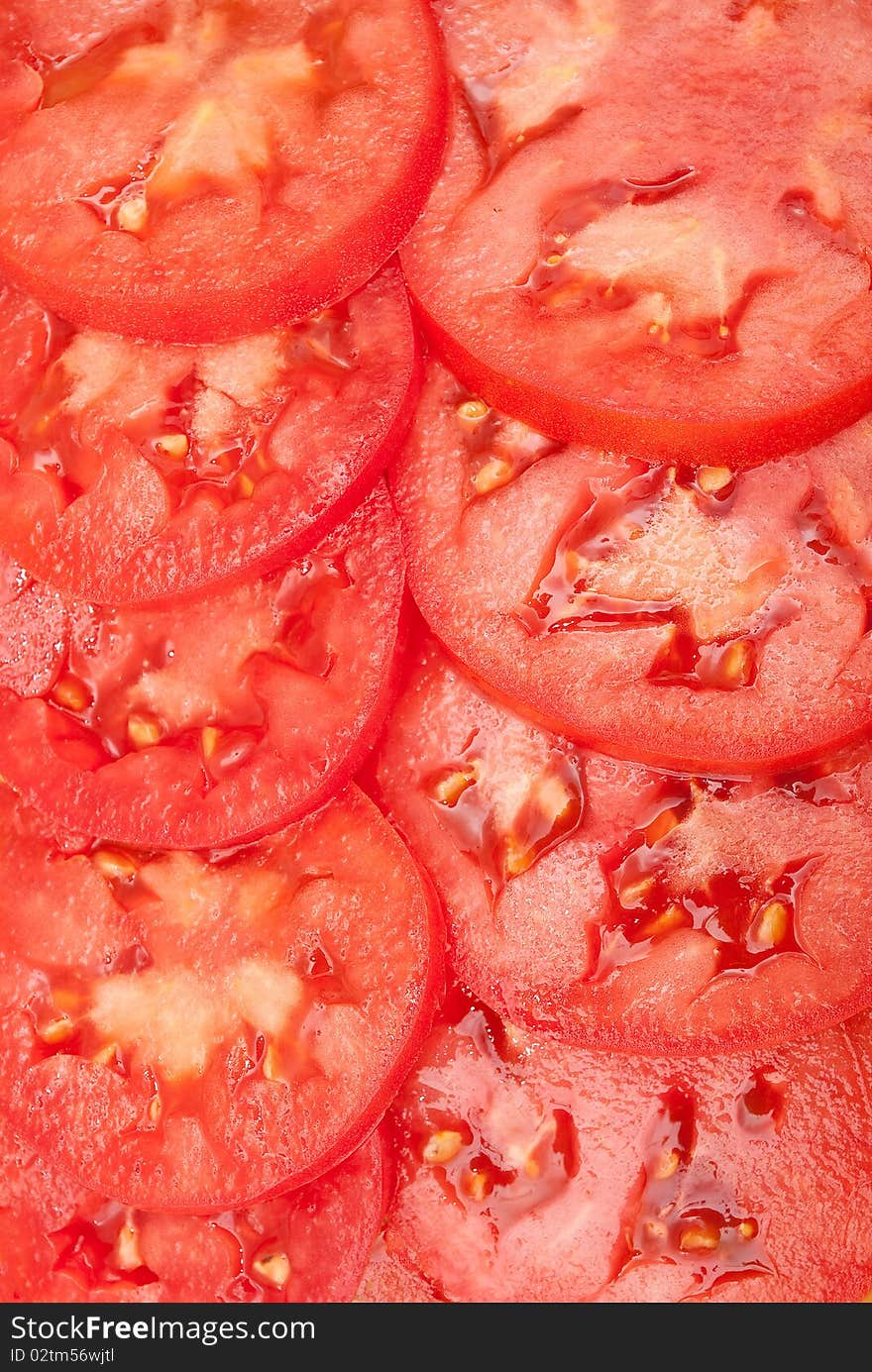 Pattern of red sliced tomatoes. Pattern of red sliced tomatoes