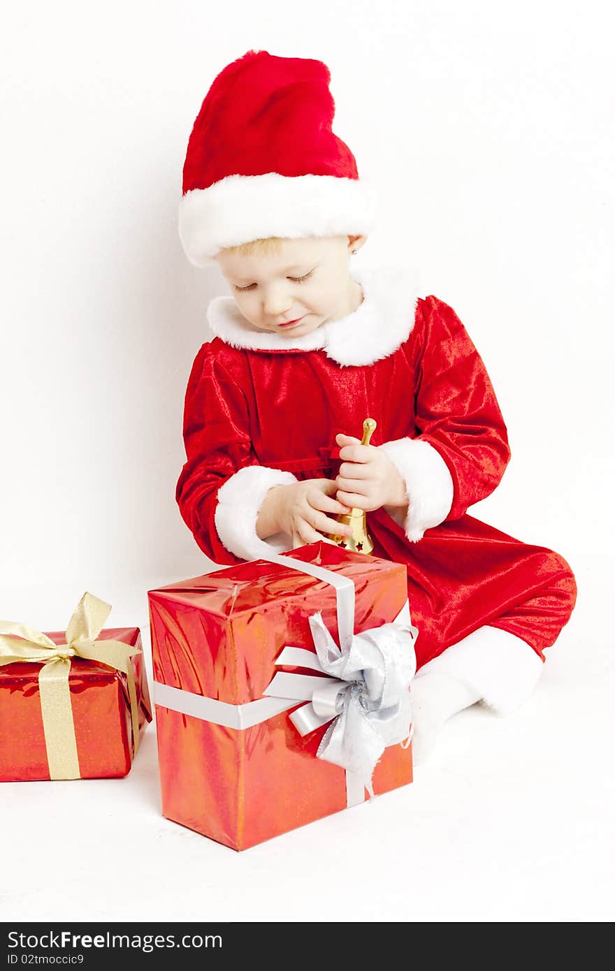 Little girl as Santa Claus with Christmas presents. Little girl as Santa Claus with Christmas presents