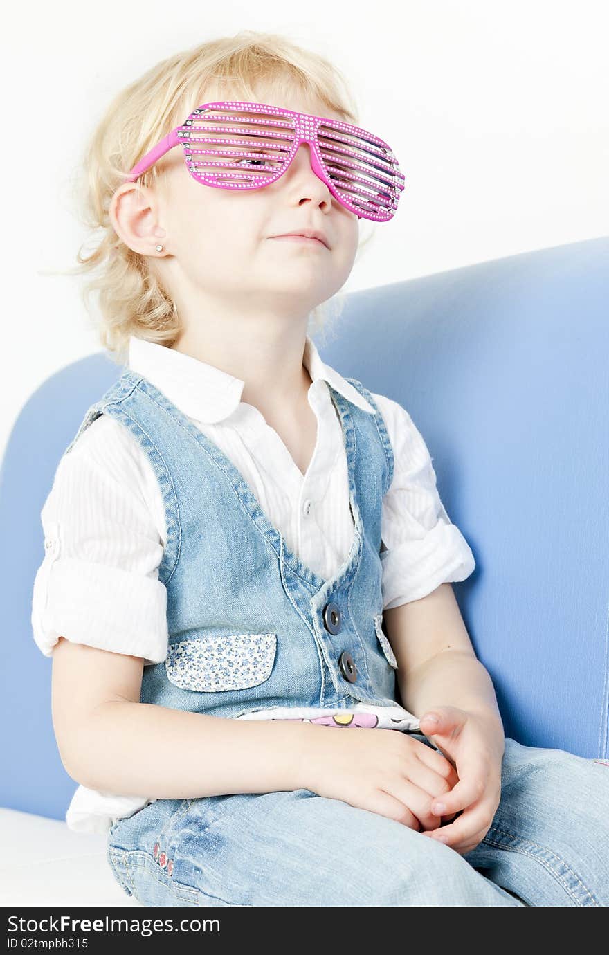 Portrait of little girl wearing glasses