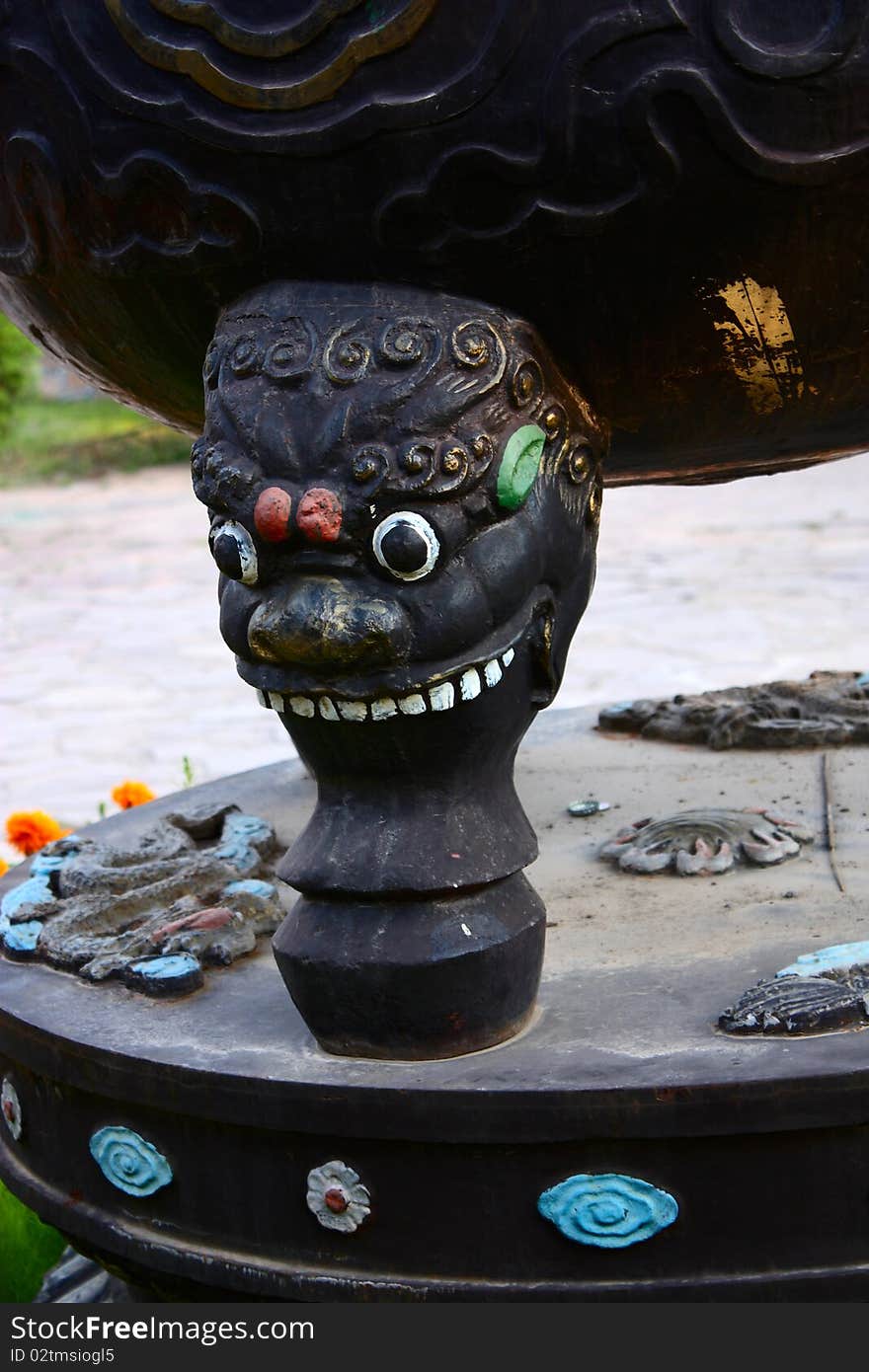 Close-up of bronze incense burner