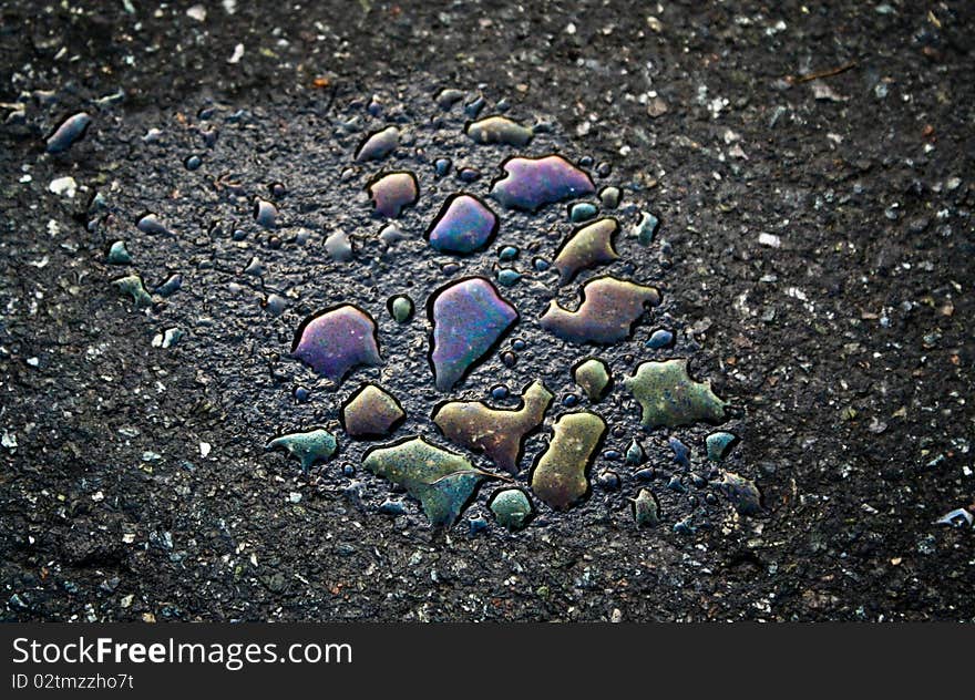 The colors Drops on asphalt