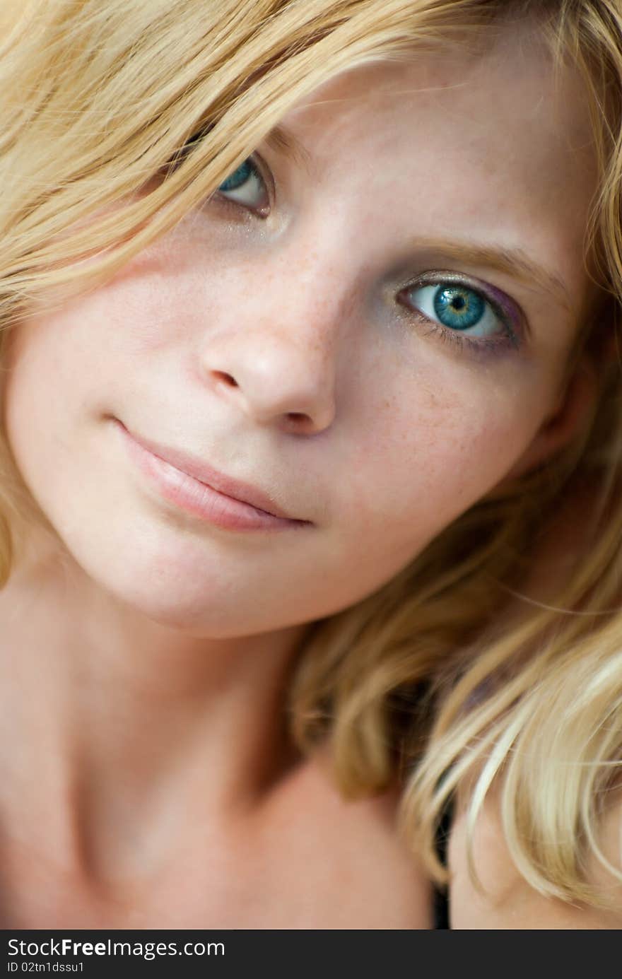 Closeup portrait of beautiful caucasian blonde. Closeup portrait of beautiful caucasian blonde.