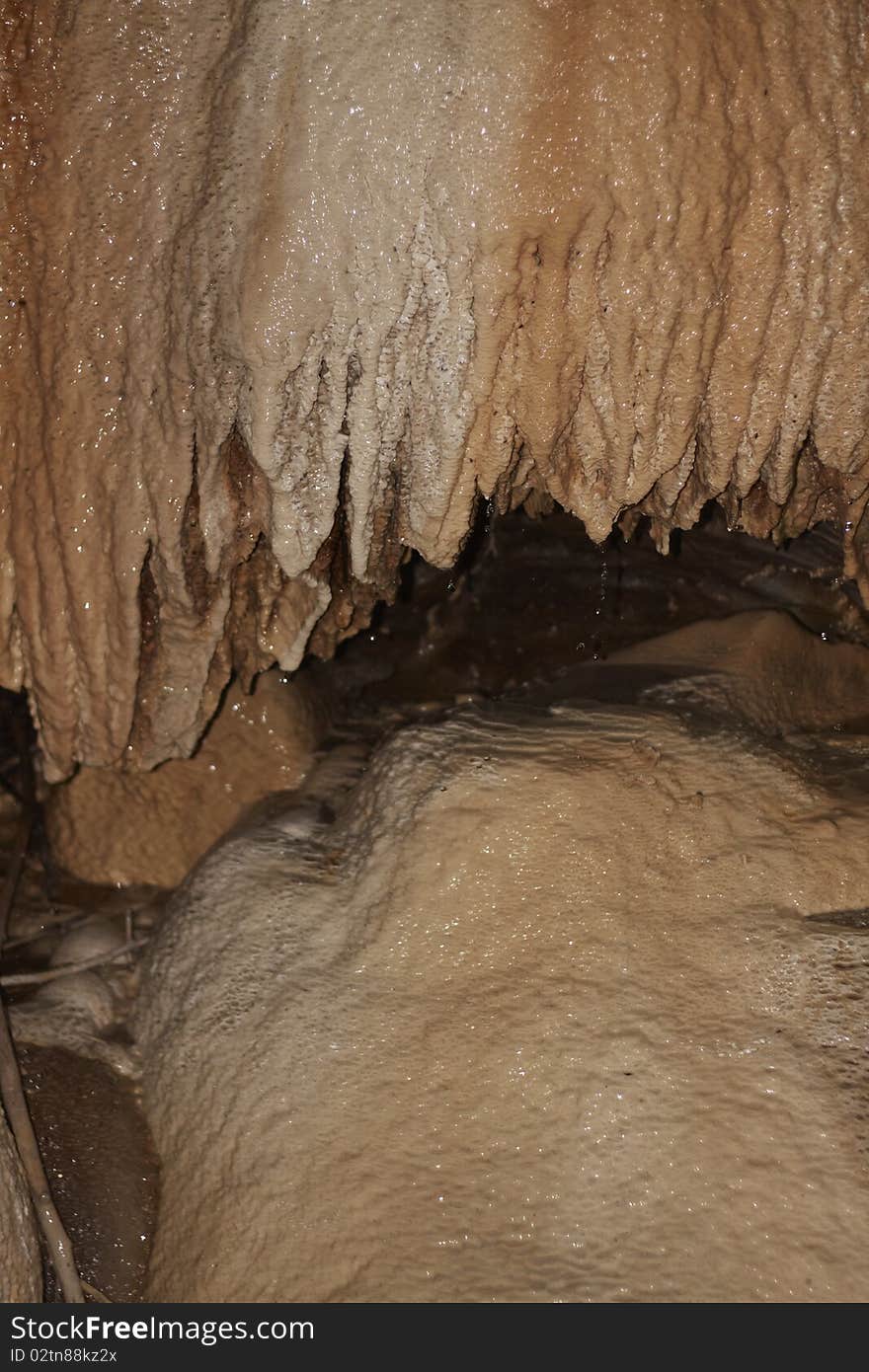 Stalactite formations in the cave with natural hot water, under Brige of Diabolo near Tatev monastery, Armenia. Stalactite formations in the cave with natural hot water, under Brige of Diabolo near Tatev monastery, Armenia