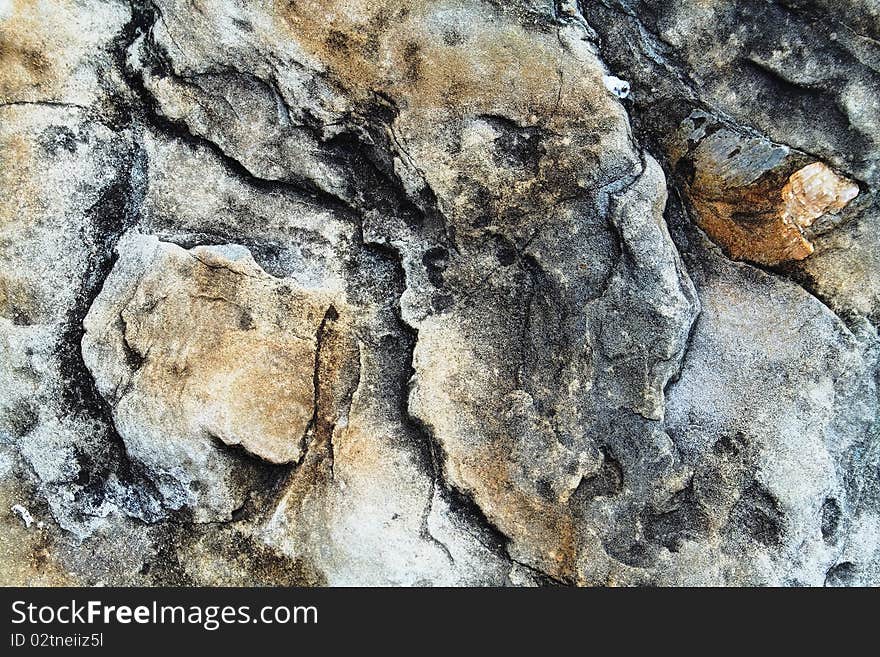 A sample of natural mountain rock texture. A sample of natural mountain rock texture