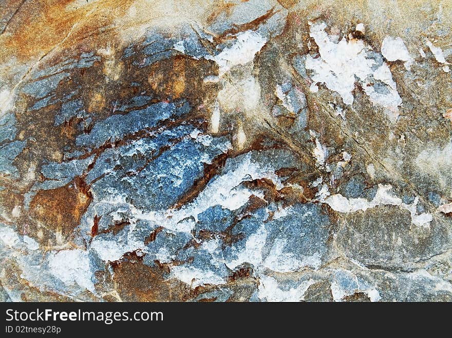 A sample of natural mountain rock texture. A sample of natural mountain rock texture