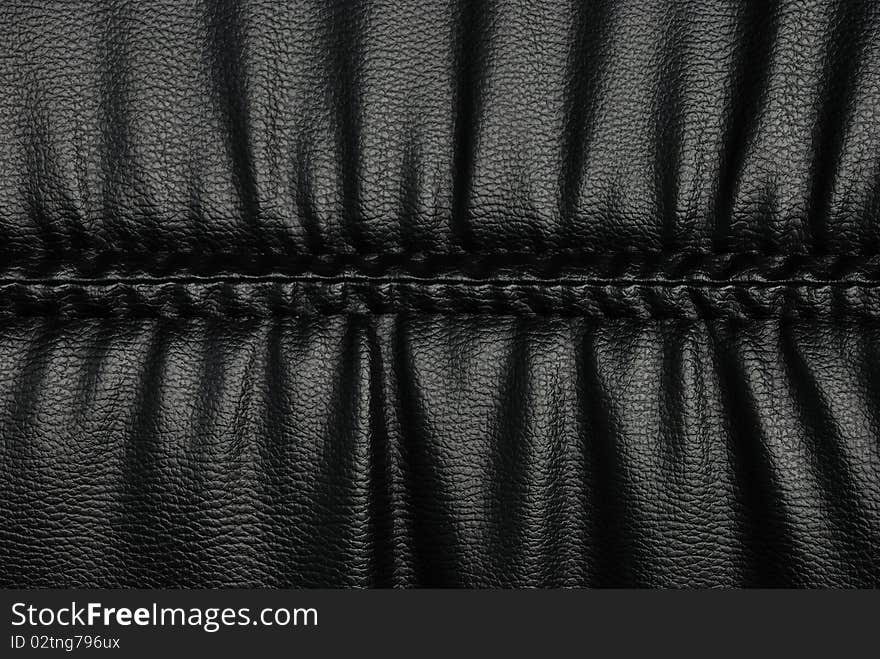 Stitch and wrinkle of black leather surface
