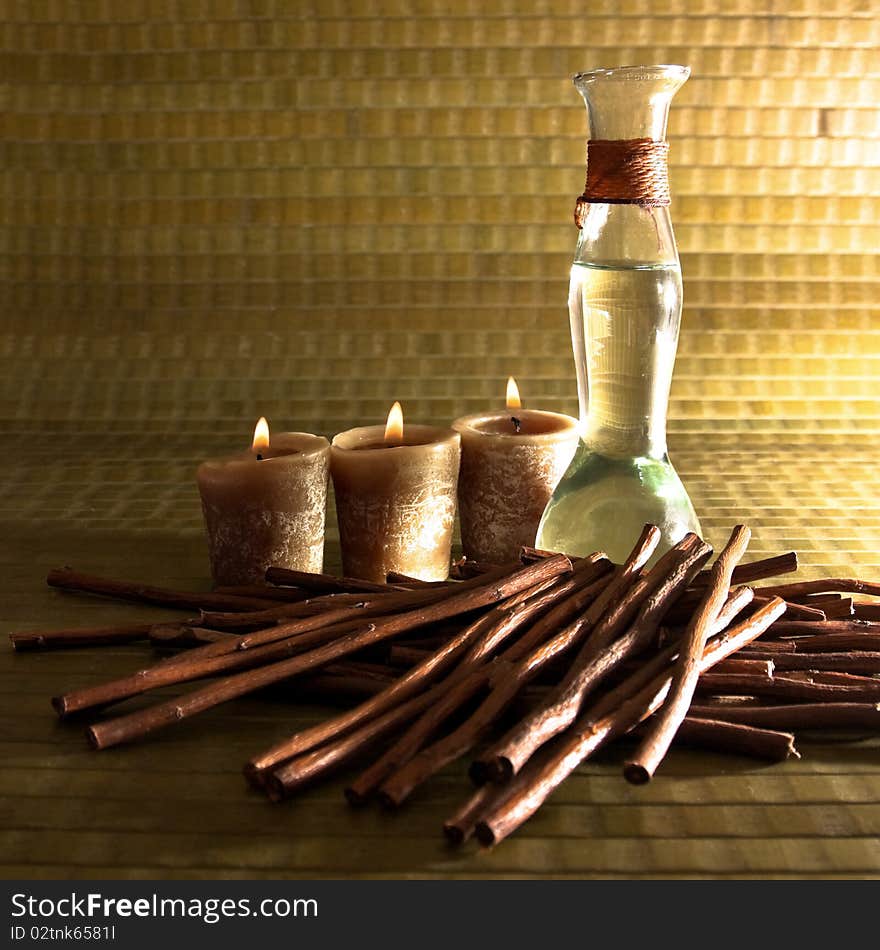 Spa concept with oil, wood, candles.