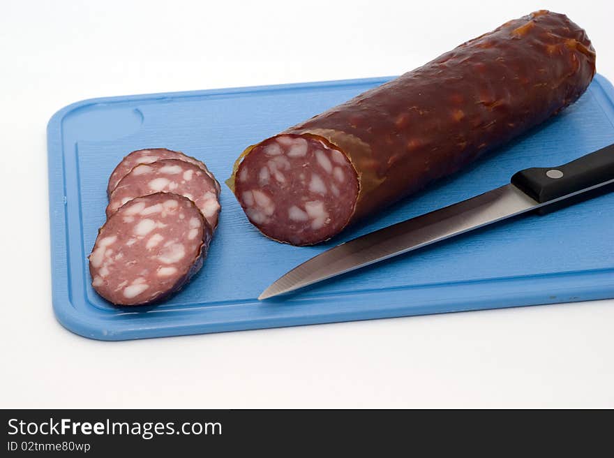 Sausage On A Chopping Board