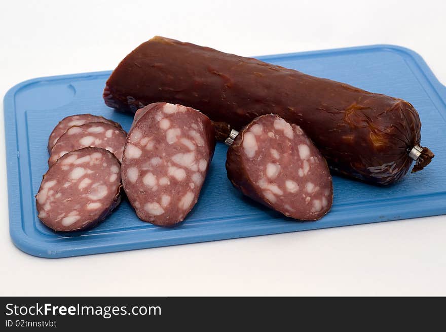 Sausage on a chopping board