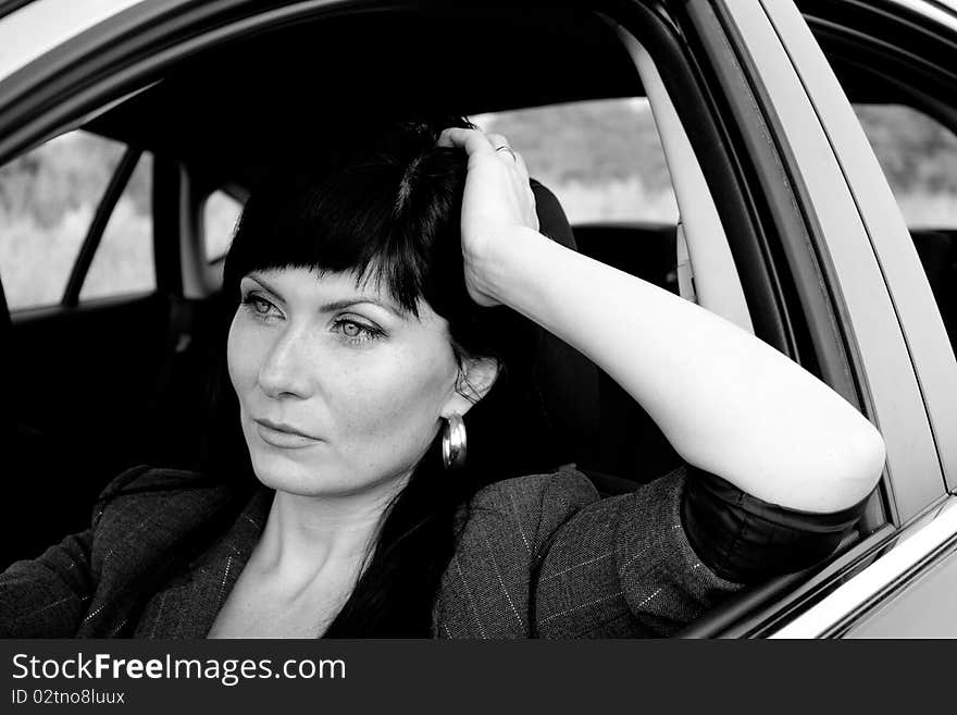 Caucasian woman in the driver's seat. Caucasian woman in the driver's seat