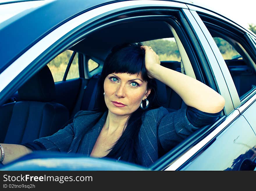 Caucasian woman in the driver's seat. Caucasian woman in the driver's seat