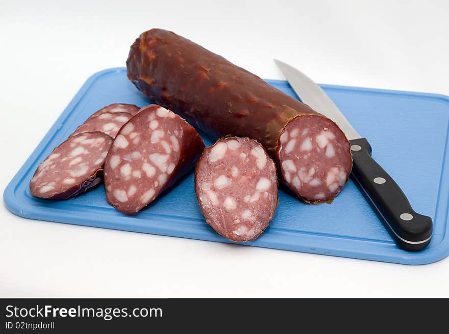 Sausage On A Chopping Board