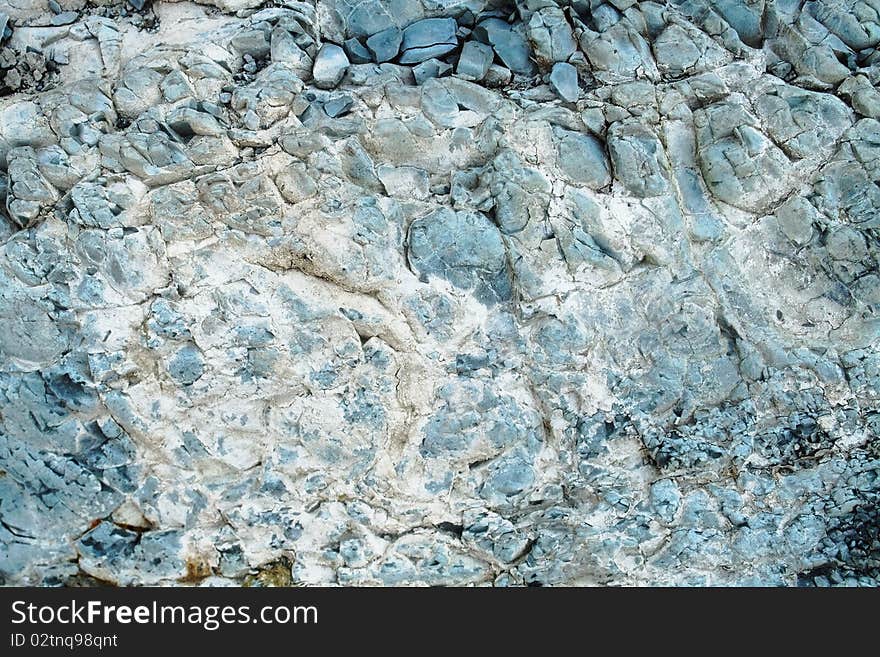 A sample of natural mountain rock texture. A sample of natural mountain rock texture