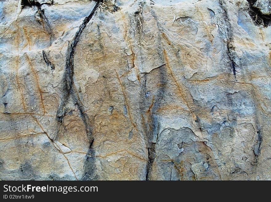 A sample of natural mountain rock texture. A sample of natural mountain rock texture