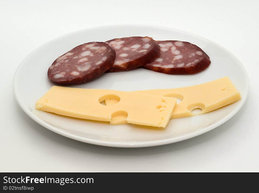 Sausage And Cheese On A Plate