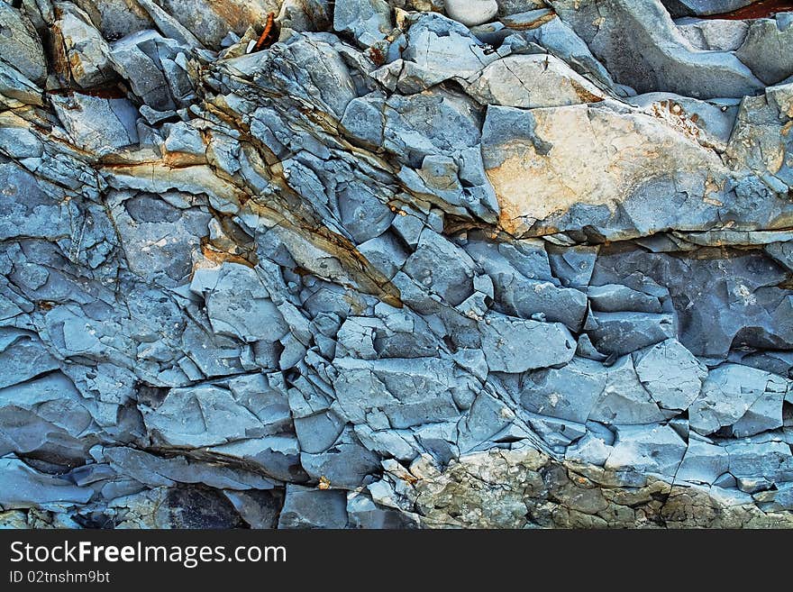 A sample of natural mountain rock texture. A sample of natural mountain rock texture