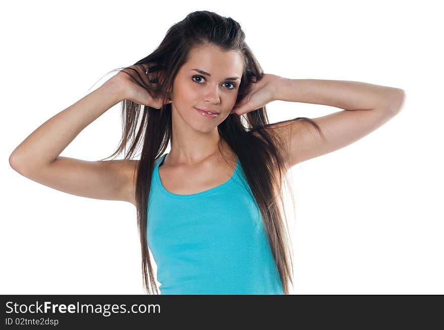 The beautiful girl with long hair it is isolated on a white background. The beautiful girl with long hair it is isolated on a white background