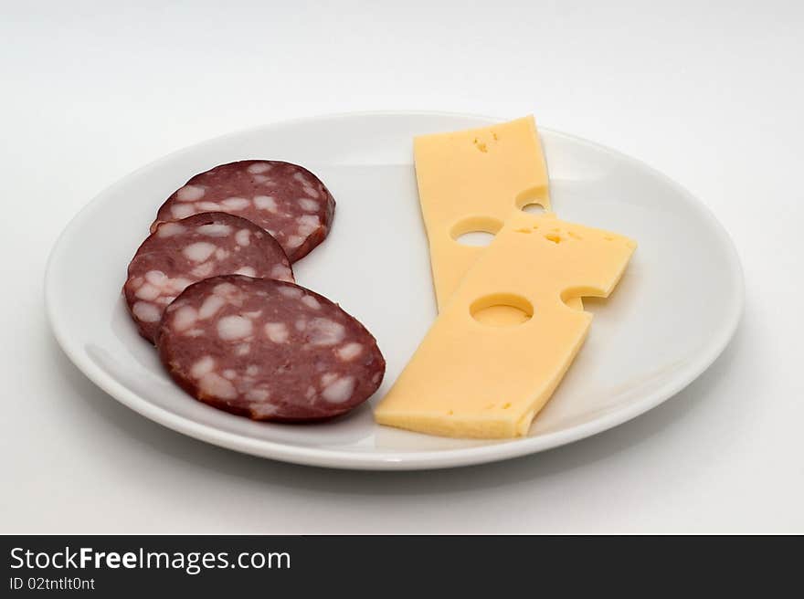 Sausage and Cheese on a plate